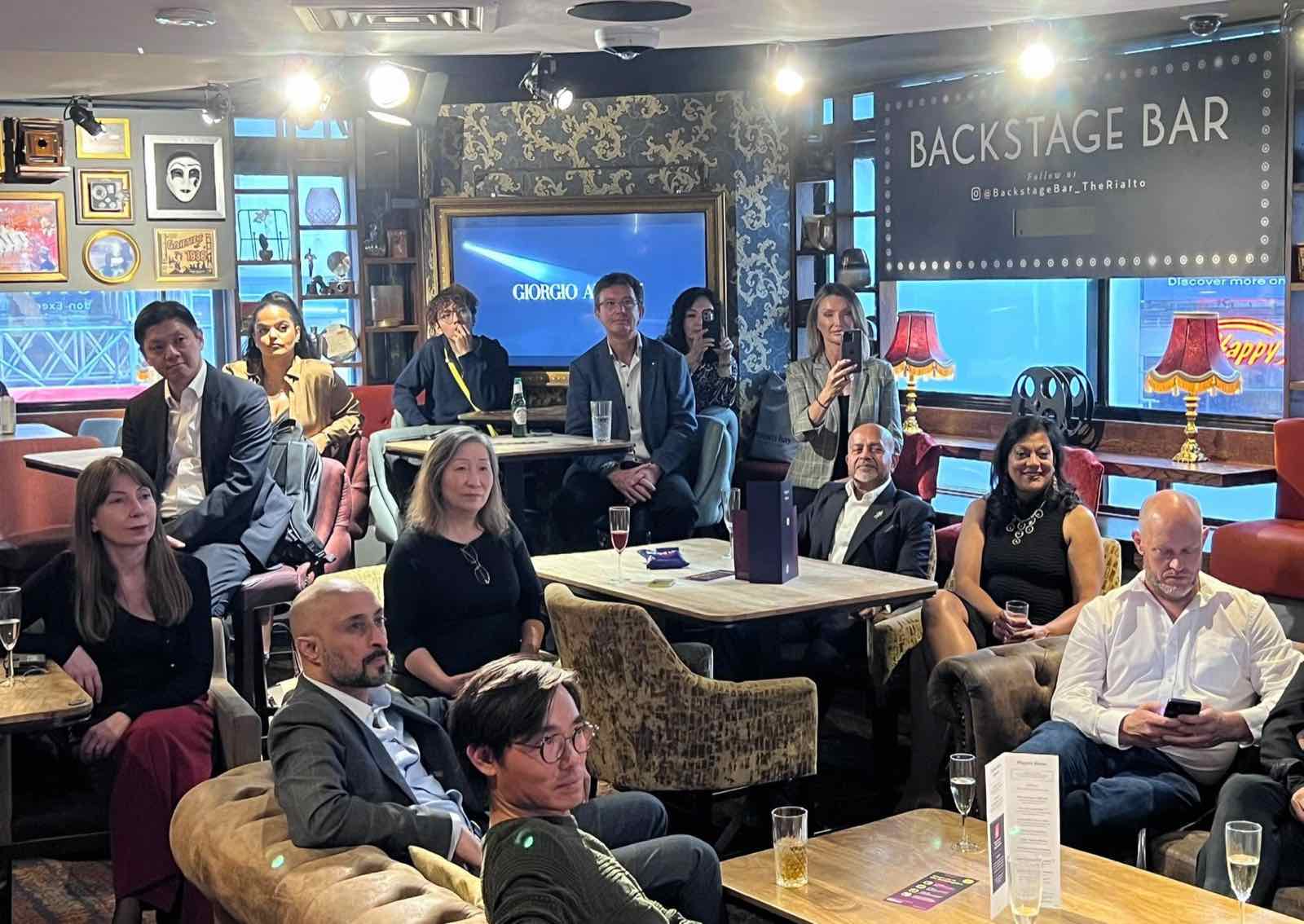 Executives and business owners seated in the Backstage Bar at the Grosvenor Rialto during the V8 Nexus September Members' Evening in Piccadilly