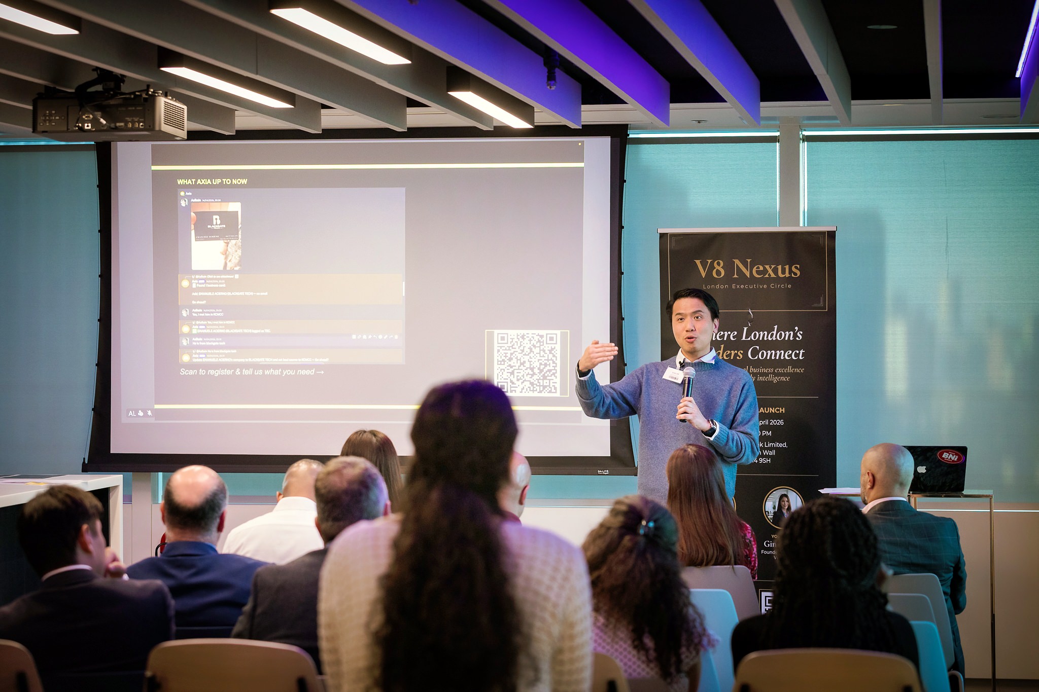 Alan Law presenting on practical AI for sales and marketing at V8 Nexus launch